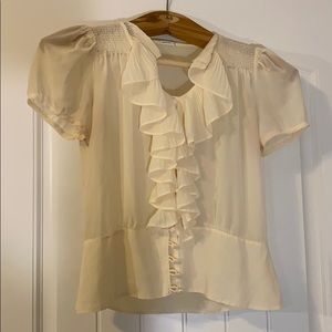 Ivory Ruffled Blouse with Elegant Buttons